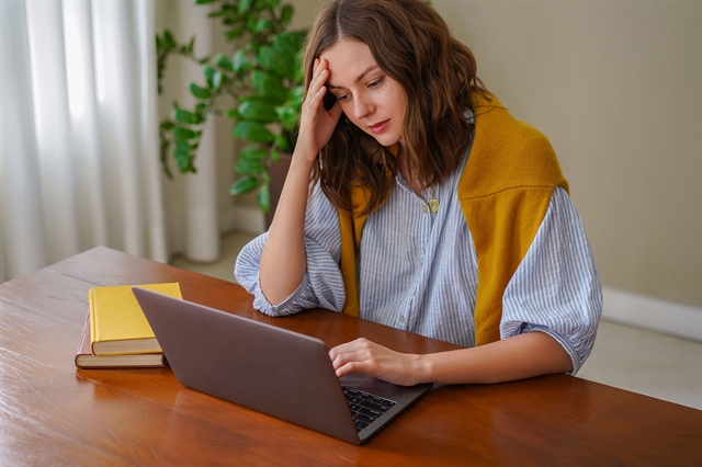 Stressed student on computer