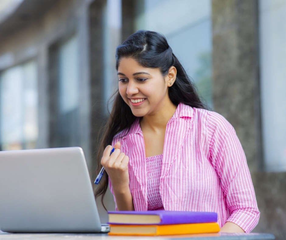 Blog image - Student looking for colleges on laptop