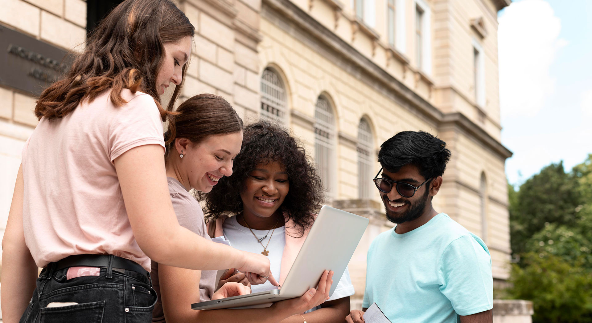 International Students looking at resources together
