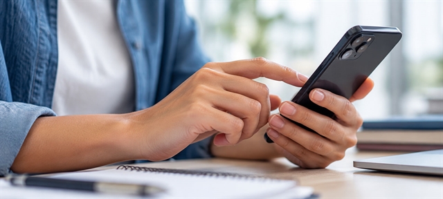 Student on mobile phone
