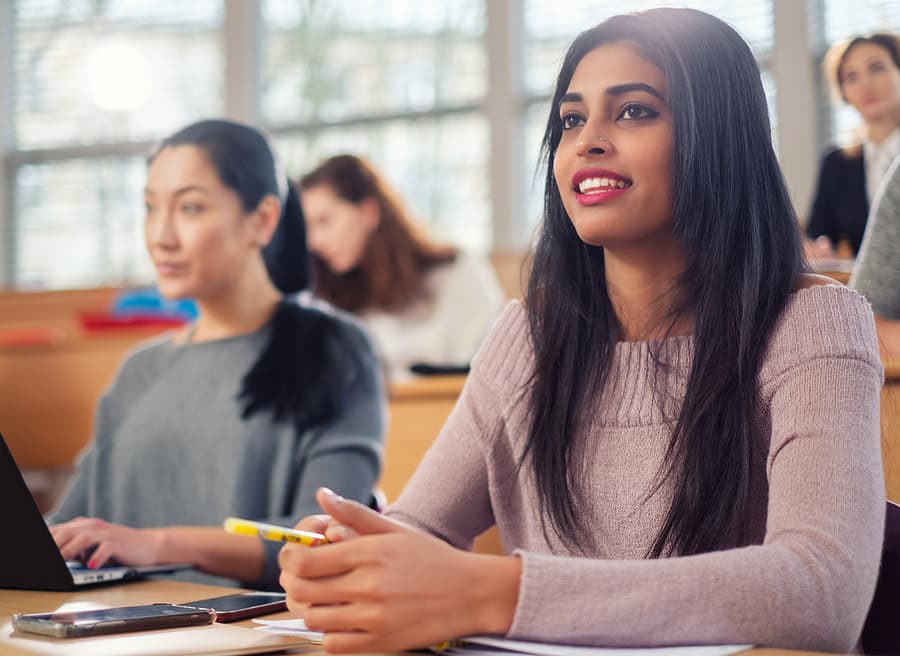 Indian woman in university classroom